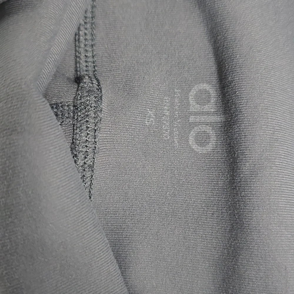 ALO YOGA MID-WAIST MOTO LEGGING